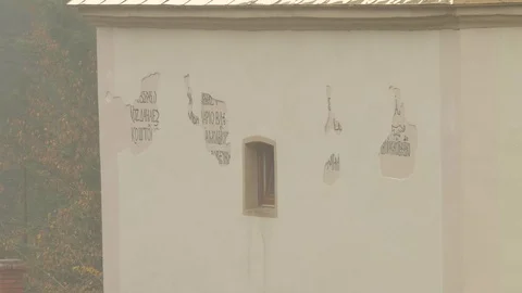Ancient Slavonic Scriptures on Wall of Church Covered Partly With Modern Stock Footage 71635006