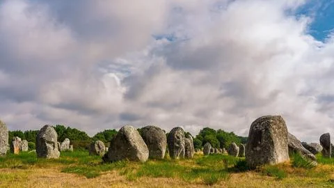 Ancient Standing Stones Under Cloudy Sky Stock Photos