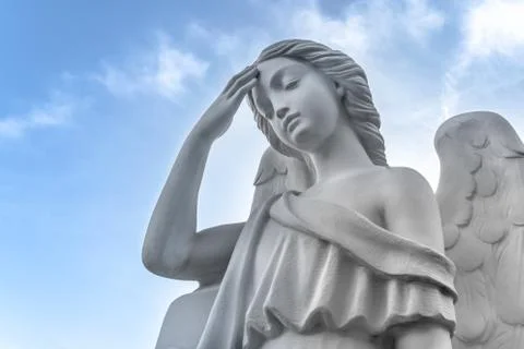 Ancient statue of an angel Stock Photos