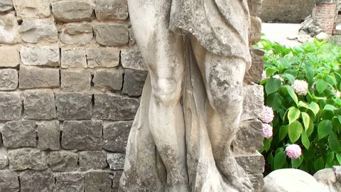 Ancient statue of gothic warrior men with a hat with wings Stock Footage 70915719