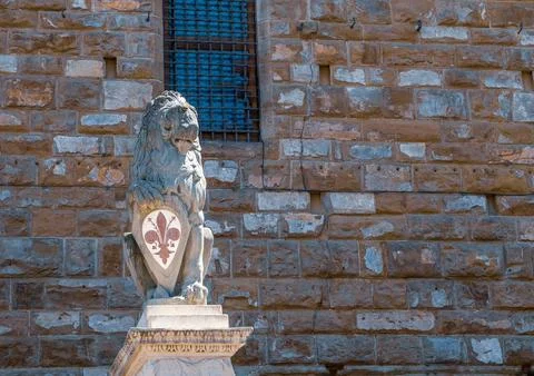 Ancient statue of a lion Stock Photos