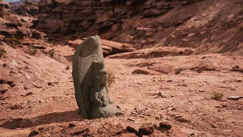 Ancient Statue on the Rocks Desert Ilustración de archivo
