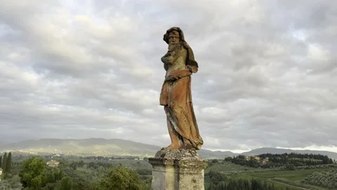 Ancient statue with Tuscan backdrop Stock Footage 235184531