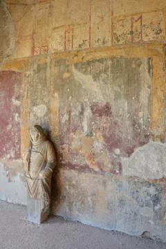 Ancient statue at the wall of the stabian baths, pompeii Stock Photos