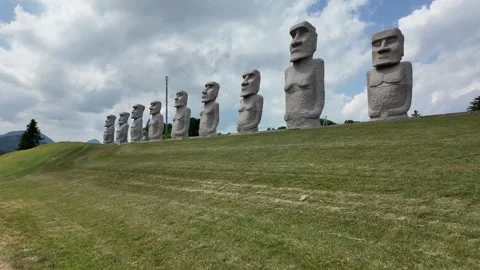 Ancient Statues Aligning on Hillside Stock Footage 313835064
