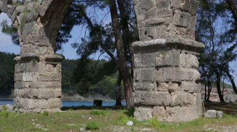 Ancient stone arch in the mountains Stock Footage 63510714
