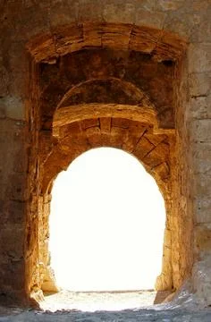 An ancient stone arch. Stock Photos