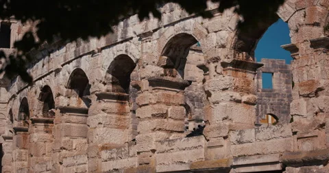 Ancient stone arches inside Pula Arena amphitheater Vídeos de archivo 334690694