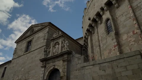 Ancient stone architecture of Avila's cathedral, showing detailed facade sc.. Stock Footage 335640549