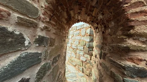 Ancient stone archway leads to distant passage. Ram Fortress, Serbia Видео 332543950