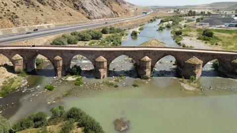 Ancient stone bridge over river Video stock 240757846
