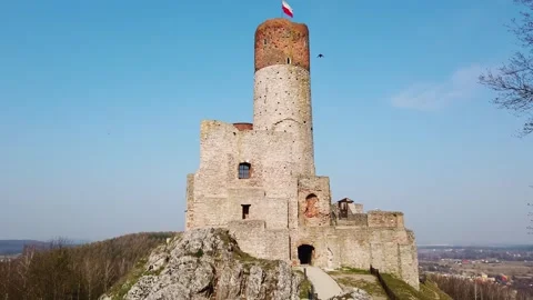 Ancient stone castle ruins standing atop rocky outcrop in rural Poland Video stock 342124463