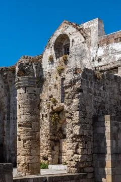 Ancient Stone Column and Gothic Ruins in Old Town Rhodes Stock Photos