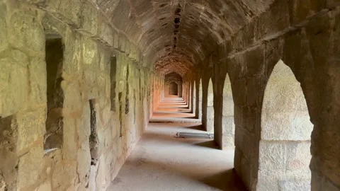 Ancient Stone Corridor with Arches at Tomb of Ghiyasuddin Tughlaq Delhi Stock Footage 333189042