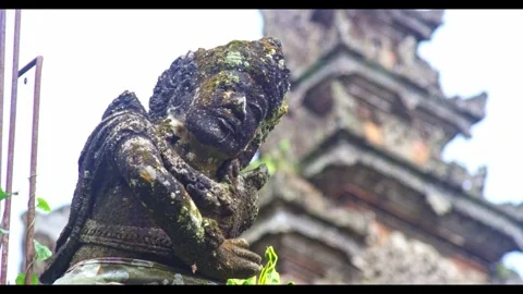 Ancient Stone Deity Statue Inside Sacred Balinese Temple | Spiritual Sanctuary  Stock Footage 330271035