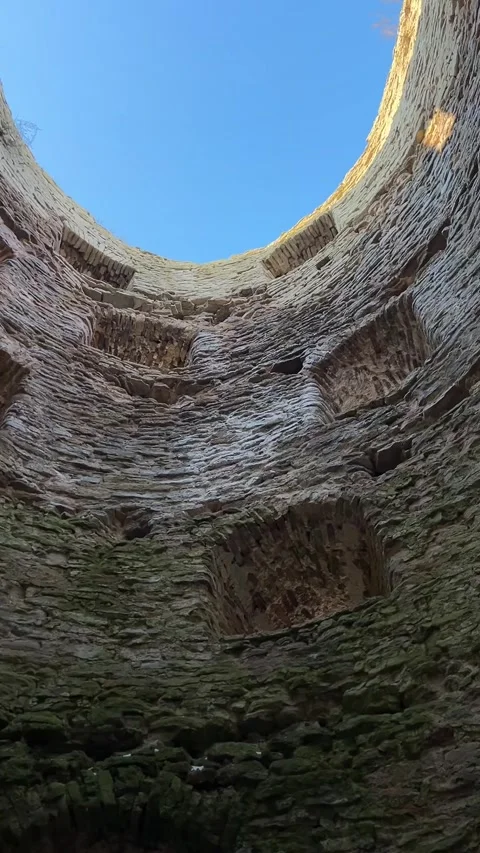 Ancient Stone Fortress Interior — Looking Up Through Old Tower Opening Video stock 319521465