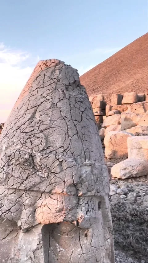 Ancient Stone Head Statue at Mount Nemrut, Turkey – Close-Up Sunset View Stock Footage 291295278