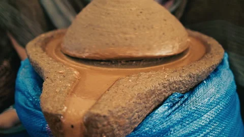 Ancient stone mill for the production of argan oil Stock Footage 314863685