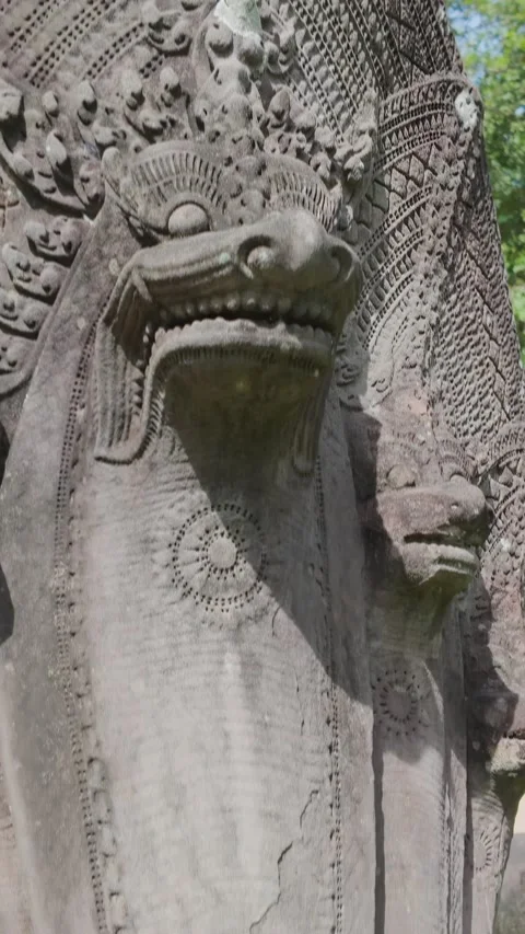 Ancient stone Naga serpent sculpture at Angkor Wat, Siem Reap, Cambodia, , Stock Footage 335666563