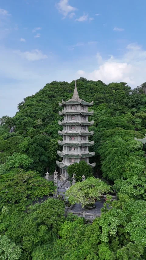 Ancient Stone Pagoda Surrounded by Lush Mountain Jungle in Da Nang, Vietnam Stock Footage 335834146