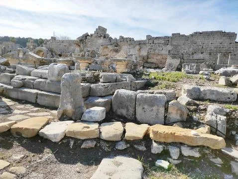 Ancient stone ruins with a pattern, fragments of ancient buildings Stock Photos
