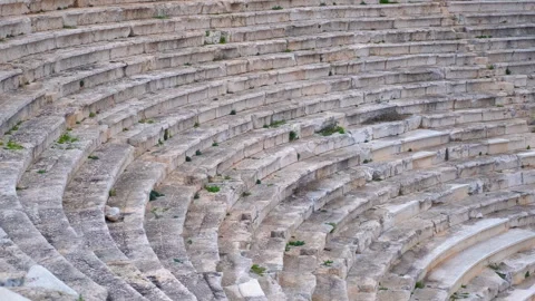 Ancient stone steps of amphitheater sweeping pan Stock Footage 319915452