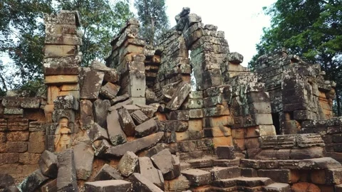 Ancient Stone Temple Ruins Decaying Amid Dense Jungle in Cambodia Stock Footage 340015300