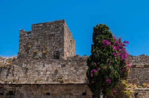 Ancient Stone Tower and Fortification Wall in Old Town Rhodes Stock Photos