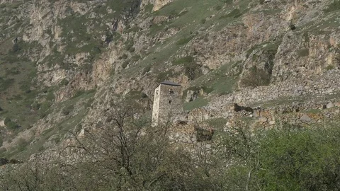 Ancient stone tower on ruins Stock Footage 75502661