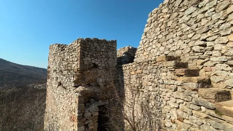 Ancient stone tower stands tall. Mount Ozren Видео 330959857