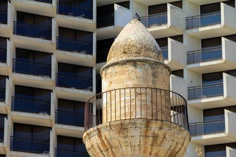 Ancient Stone Towered Structure with Modern Building Background, Tiberias, .. Stock Photos