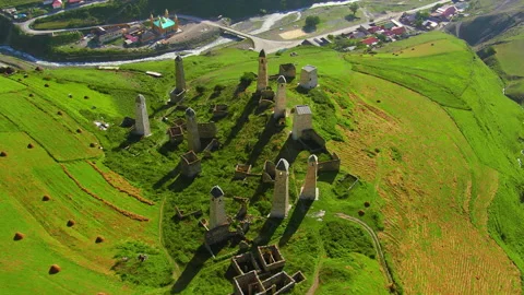 Ancient stone towers complex aerial view in the Caucasus mountains Stock Footage 337011050