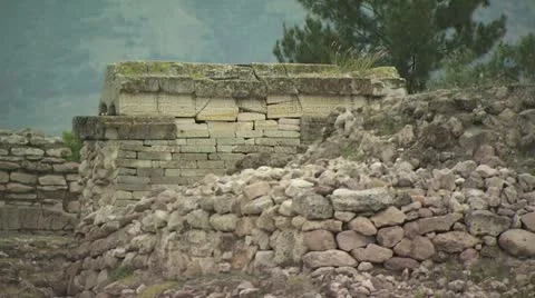 Ancient Stone Wall and Building in Mexico Stockbeeldmateriaal 19298248