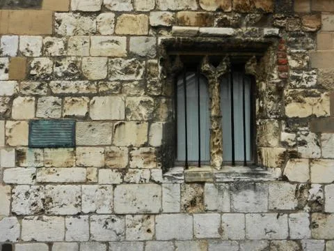 Ancient stone wall and window Stock Photos