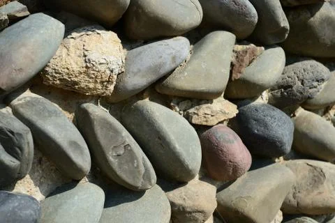 Ancient stone wall background and texture Stock Photos