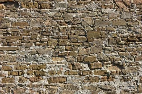 Ancient stone wall background Stock Photos