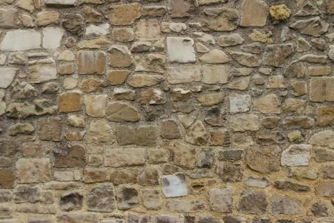 Ancient stone wall background Stock Photos