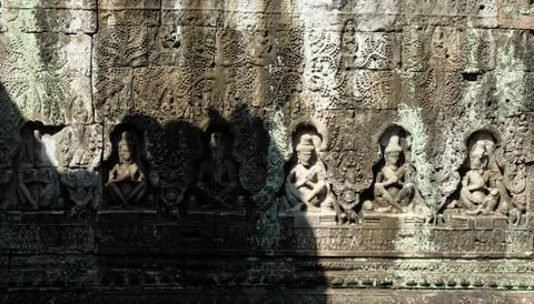Ancient stone wall with a bas-relief. Pattern on a stone wall. Foto stock