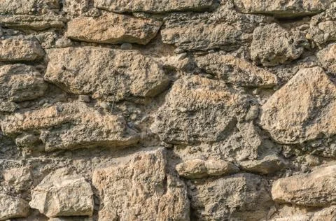 Ancient stone wall texture and background Stock Photos