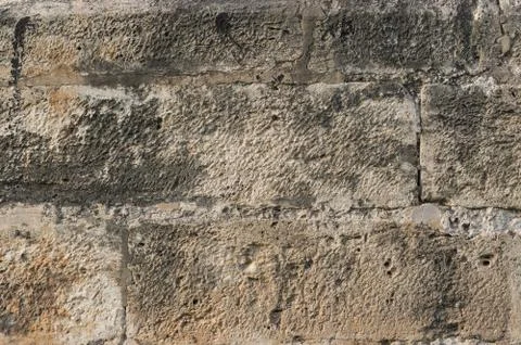 Ancient stone wall texture and background Stock Photos