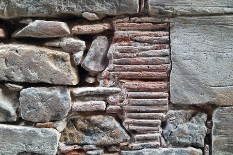 Ancient Stone Wall Texture for Architectural Design and Historical Study Foto stock