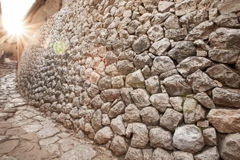 Ancient stone wall texture. Stock Photos