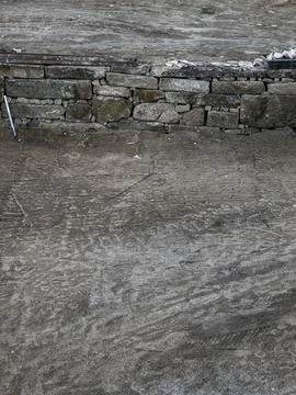 Ancient stone wall under reconstruction with rocks Stock Photos