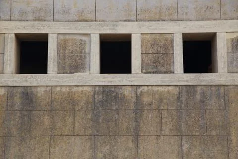 Ancient stone wall with windows Stock Photos