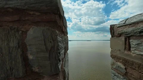 Ancient stone walls frame a vast, calm lake. Ram Fortress, Serbia Vidéo 332543558
