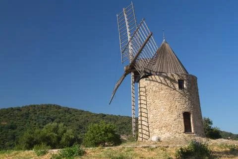 Ancient stone windmill.Horizontally. Stock Photos