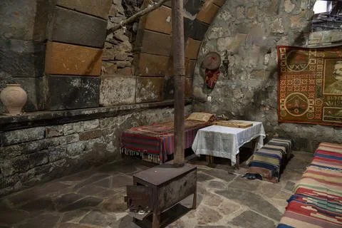 Ancient Stone Wine Cellar with Authentic Furnishings Stock Photos