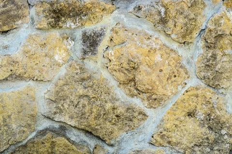 Ancient stonework. A natural stone. Stock Photos