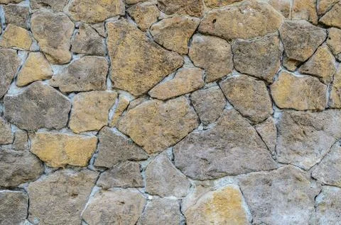 Ancient stonework. A natural stone. Stock Photos