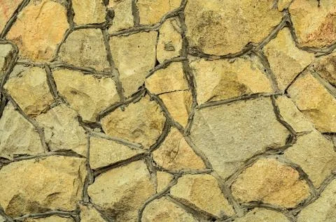 Ancient stonework. A natural stone. Stock Photos